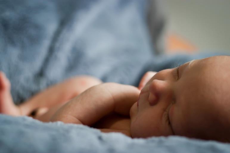 A sleeping newborn.