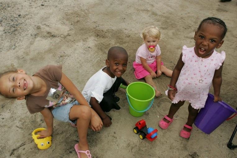 Children playing in the sand.