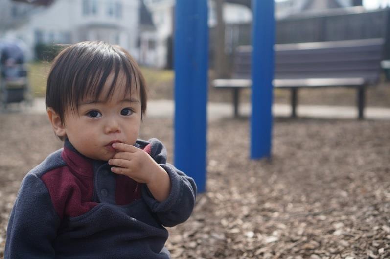 A toddler at a park.