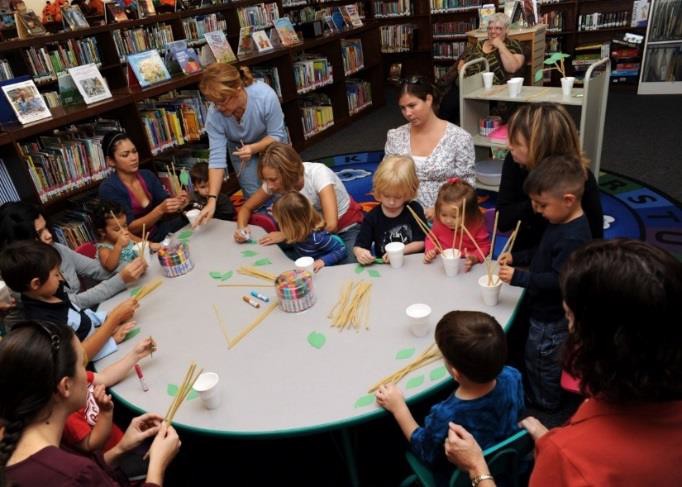 A group of children making crafts.