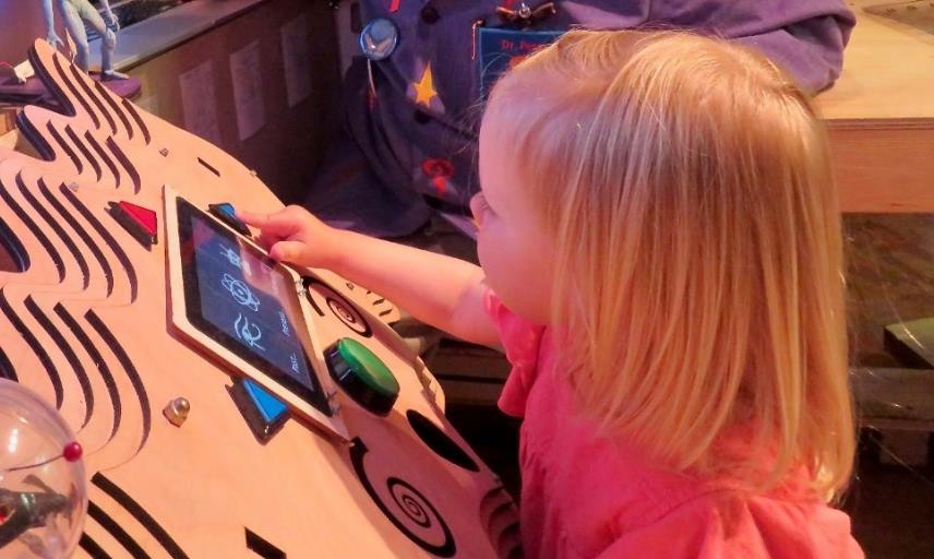 A child playing a game that measures her sustained attention.