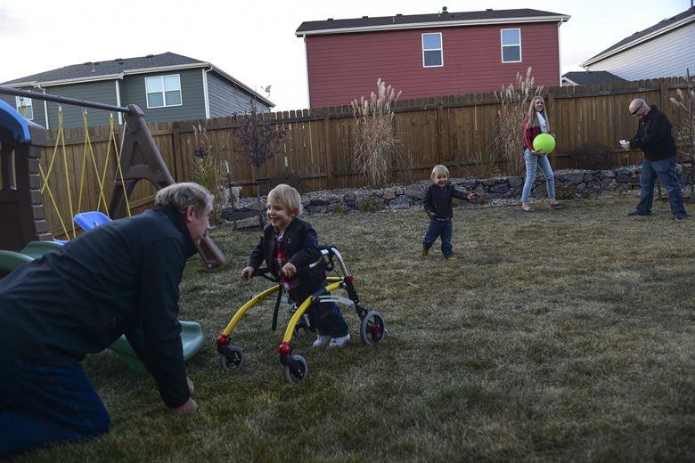 A family playing outside together.